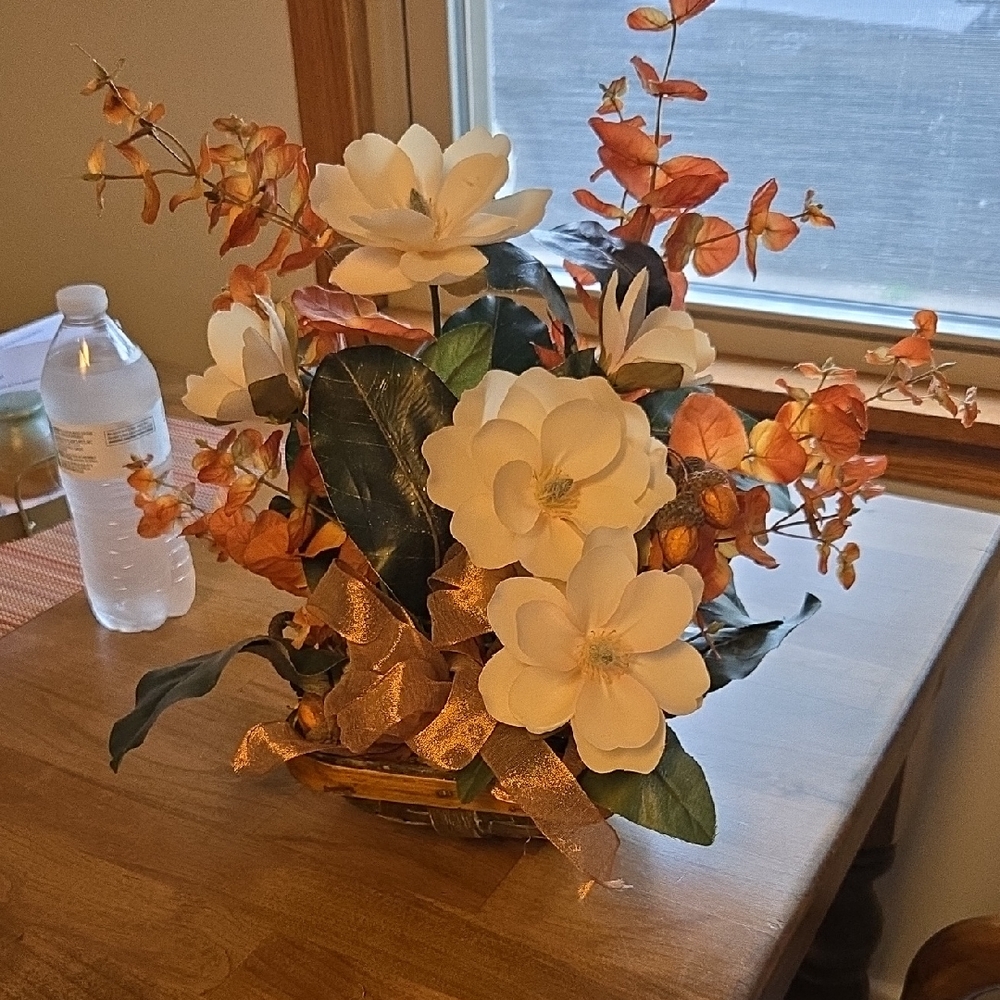 Elegant Floral Arrangement with White and Orange Accents